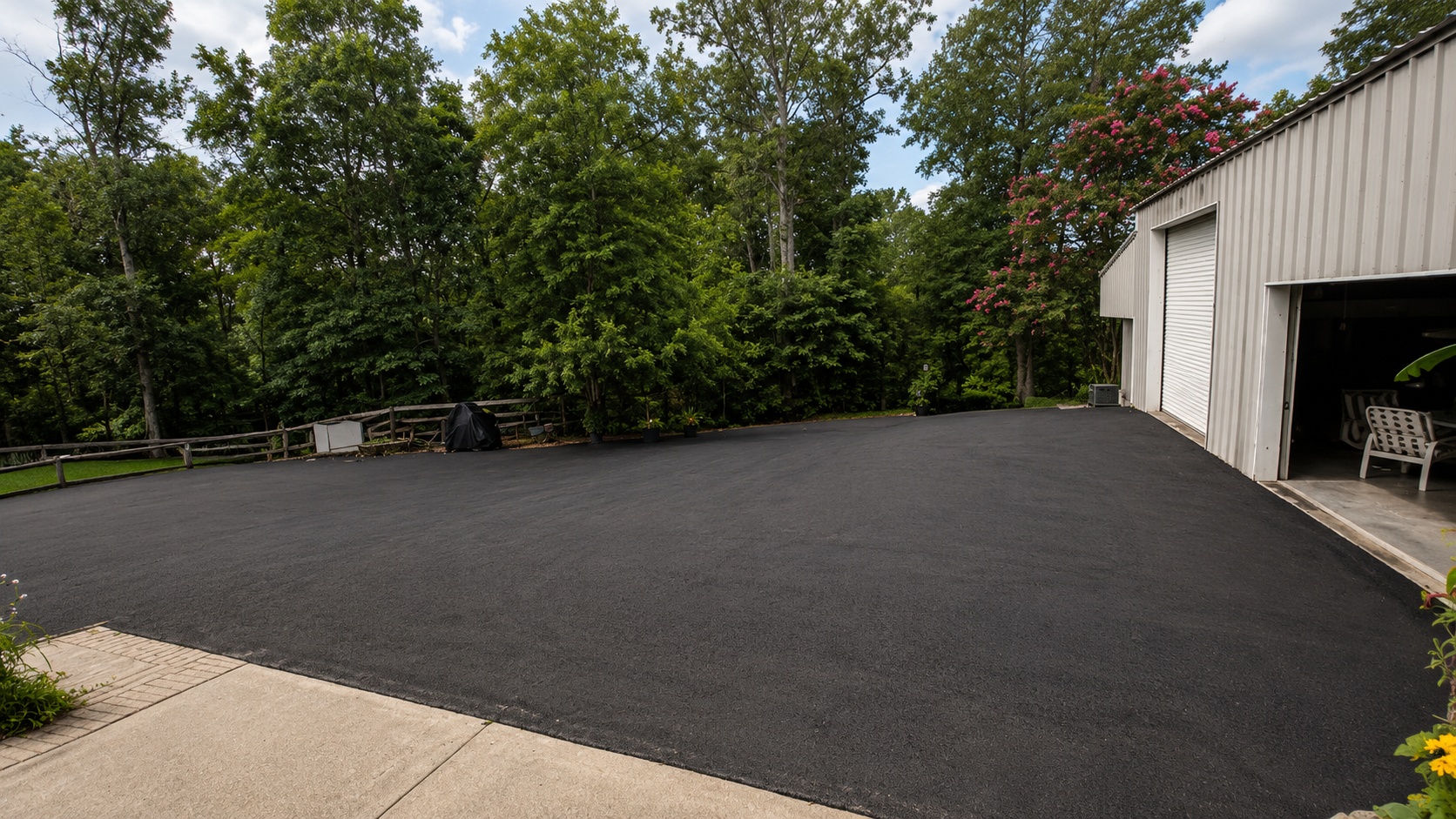 Large residential driveway after professional sealcoating