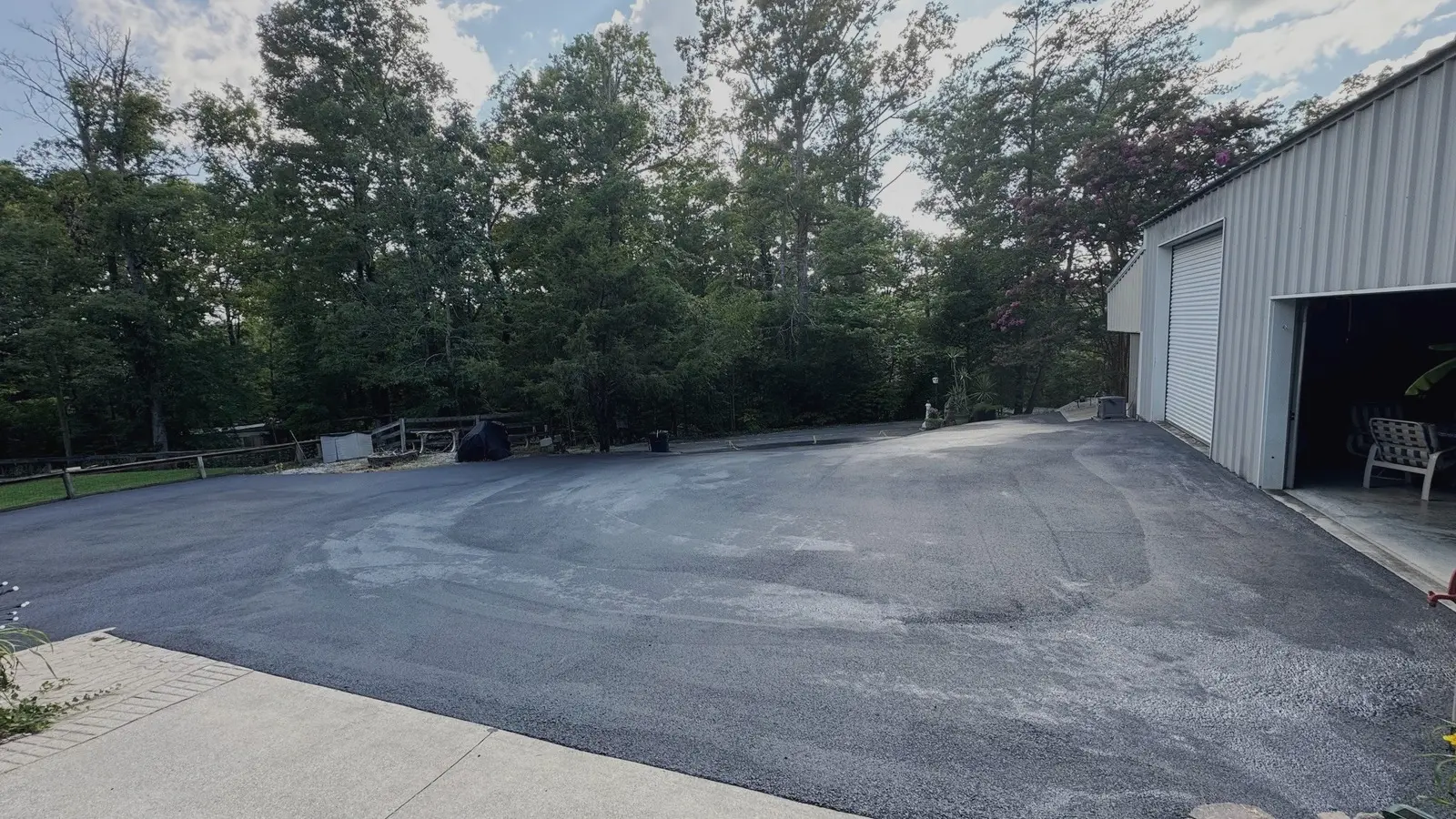 Large driveway after professional sealcoating