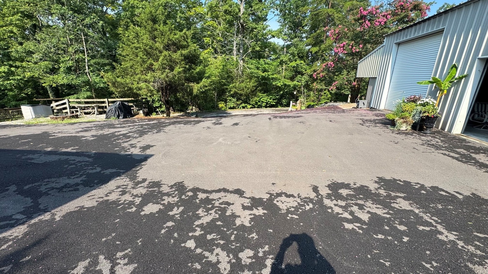 Large residential driveway before professional sealcoating